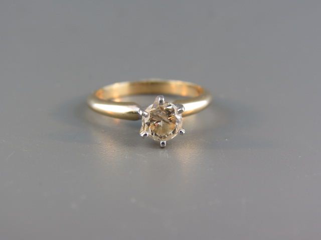 Appraisal: Fancy Colored Diamond Ring carat round brilliant fancy light brown