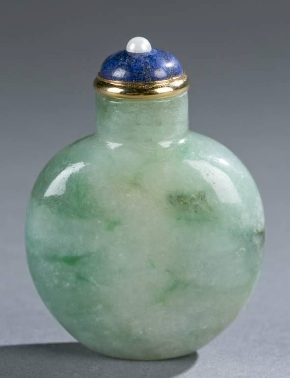 Appraisal: Chinese green jadeite snuff bottle A Chinese green jadeite snuff