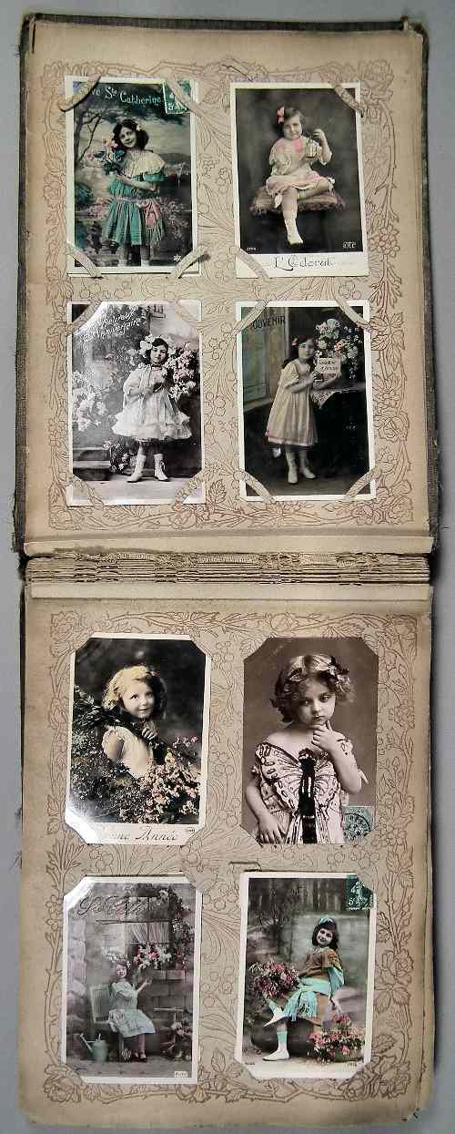 Appraisal: An early th Century French postcard album with printed pages