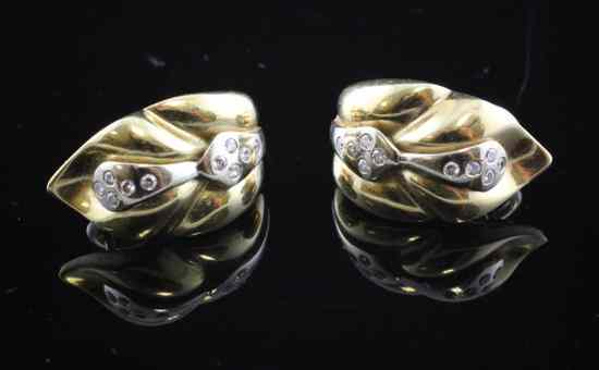 Appraisal: A pair of diamond set two colour gold leaf shaped