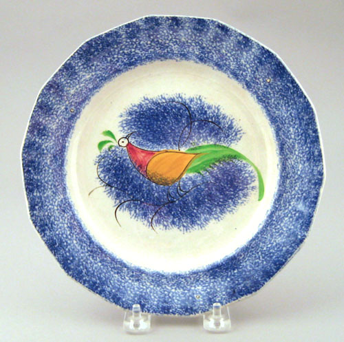 Appraisal: Blue spatter plate th c with peafowl dia