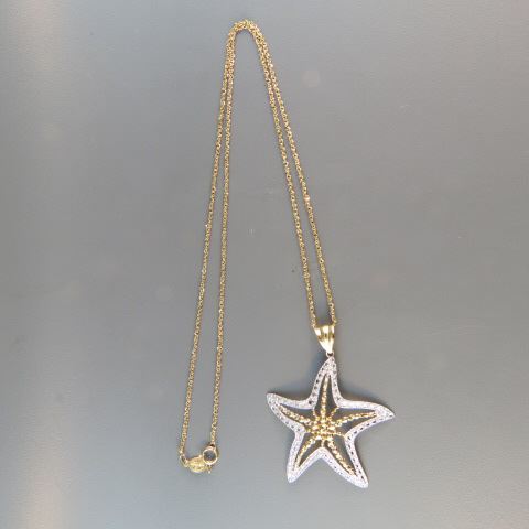 Appraisal: k Necklace with Starfish Pendant white and yellow gold long