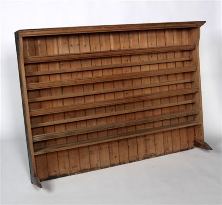 Appraisal: A th century pine plate rack the projected moulded cornice