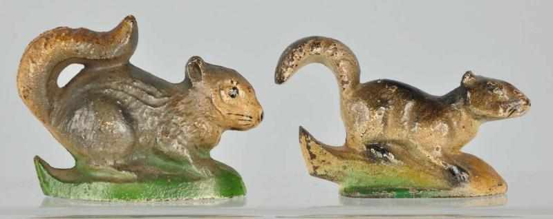 Appraisal: Cast Iron Squirrel Bottle Openers Description Manufactured by John Wright