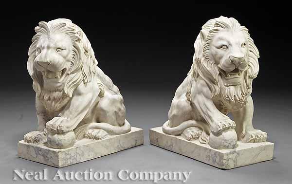 Appraisal: A Pair of White Marble Lions with their paws resting