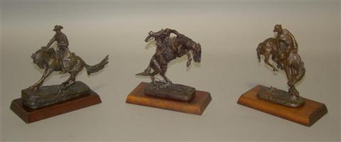 Appraisal: THREE BRONZES AFTER FREDERIC REMINGTON Franklin Mint including The Bronco