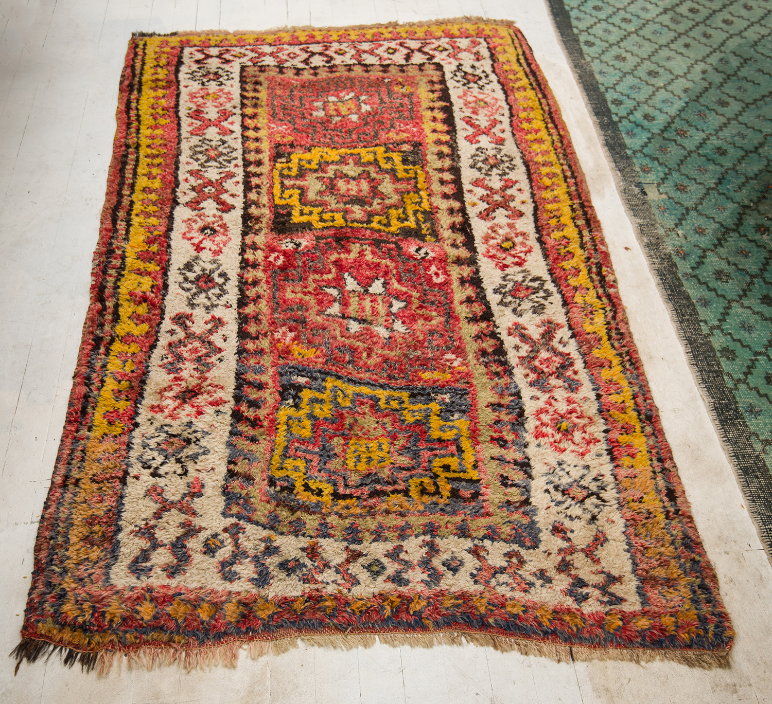 Appraisal: A COLOURED HAND WOVEN RUG x cm