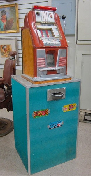 Appraisal: MILLS -CENT SLOT MACHINE ON FLOOR CABINET a Mills High