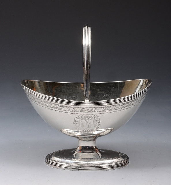 Appraisal: A GEORGE III OVAL SHAPED SWEETMEAT DISH with engraved foliate