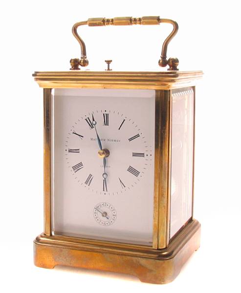 Appraisal: A gilt brass carriage clock with subsidiary alarm dial height