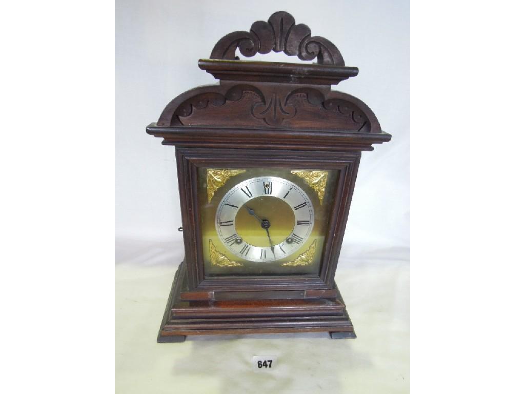 Appraisal: An early th century mantel clock with carved wooden case