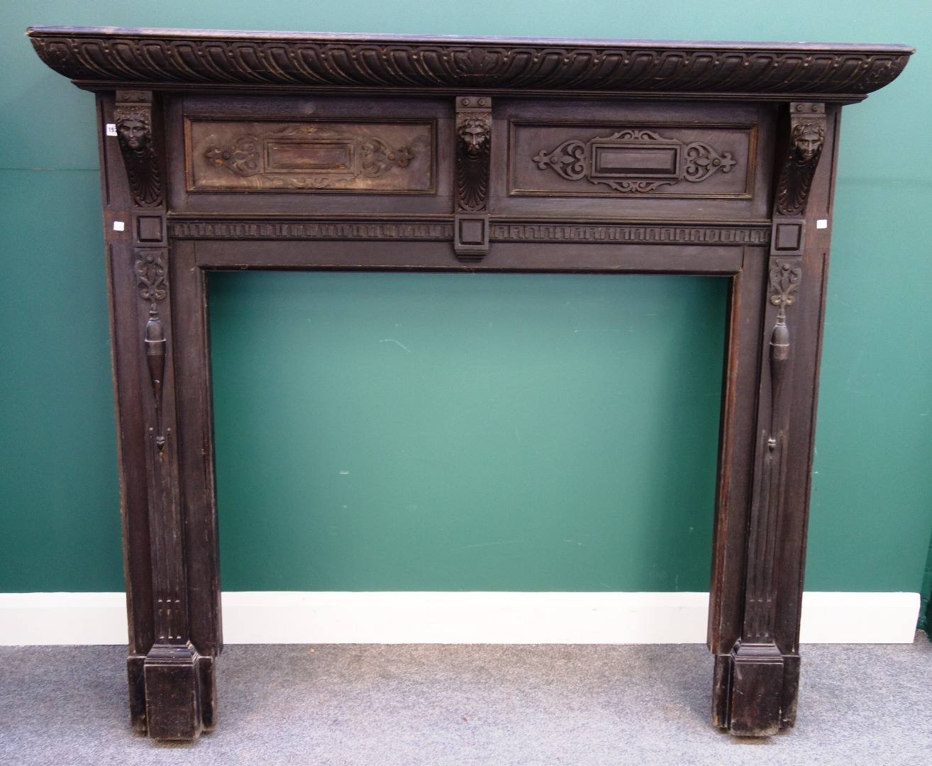 Appraisal: A th century style oak fire surround with gadrooned edge