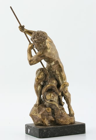 Appraisal: Neptune above spearing octopus below oblong black marble base t