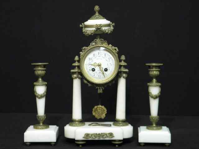 Appraisal: French A D Mougin white marble garniture clock set Includes