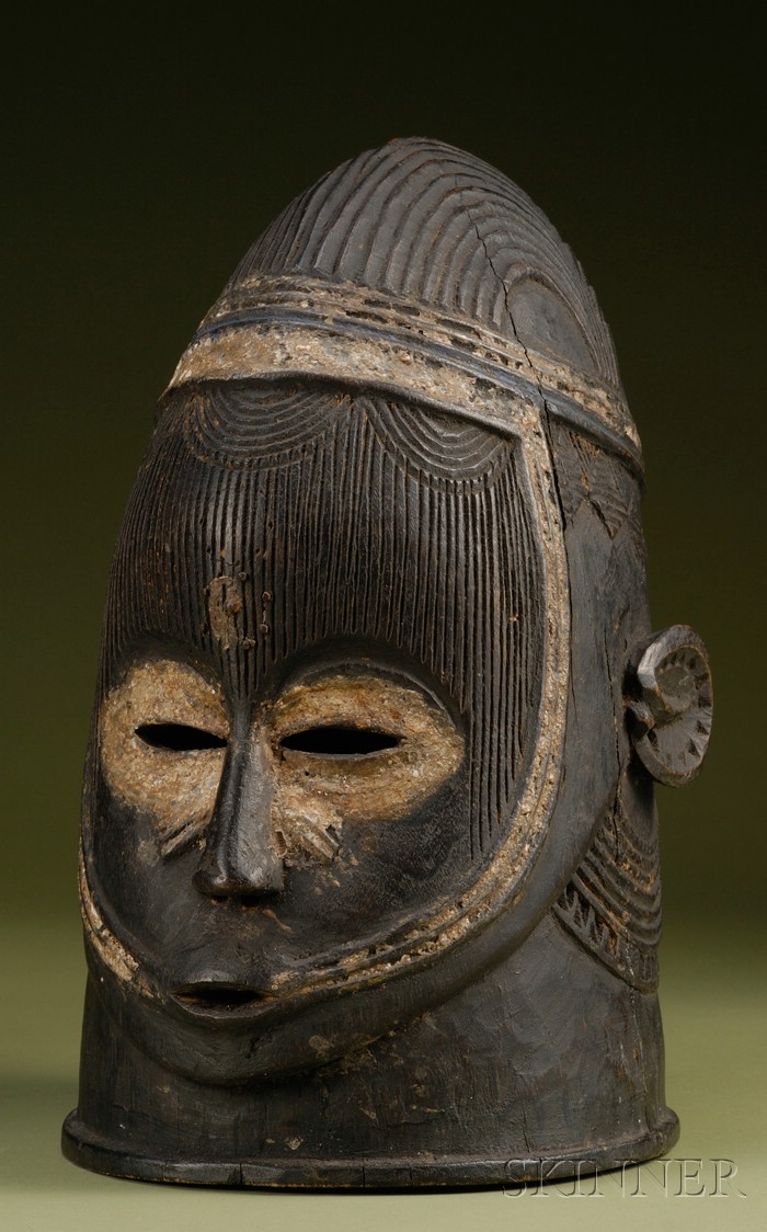 Appraisal: African Carved Wood Helmet Mask Igala pierced eyes and mouth