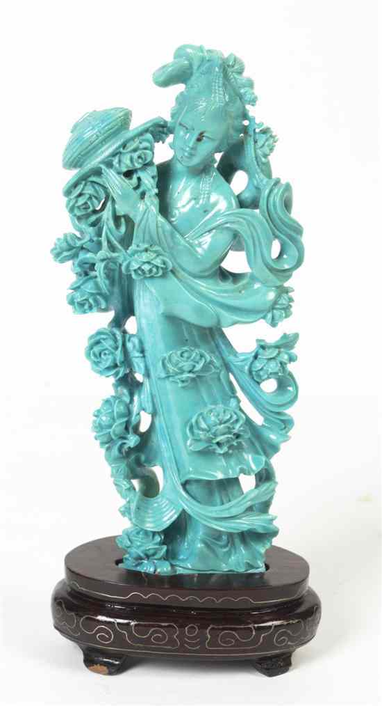 Appraisal: A Chinese Stone Carving of a Lady of turquoise colored