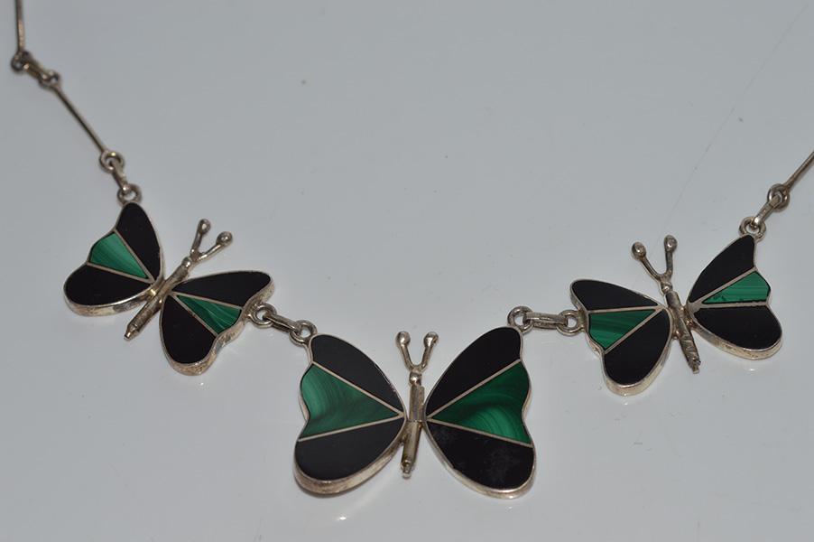 Appraisal: A STERLING SILVER BUTTERFLY PENDANT NECKLACE SET WITH BLACK ONYX