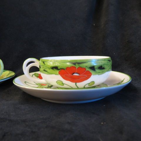 Appraisal: Handpainted Porcelain Cups Saucers poppy flowering vine decor