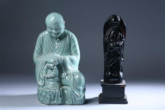 Appraisal: JAPANESE CELADON PORCELAIN FIGURE OF MONK Seated holding prayer beads