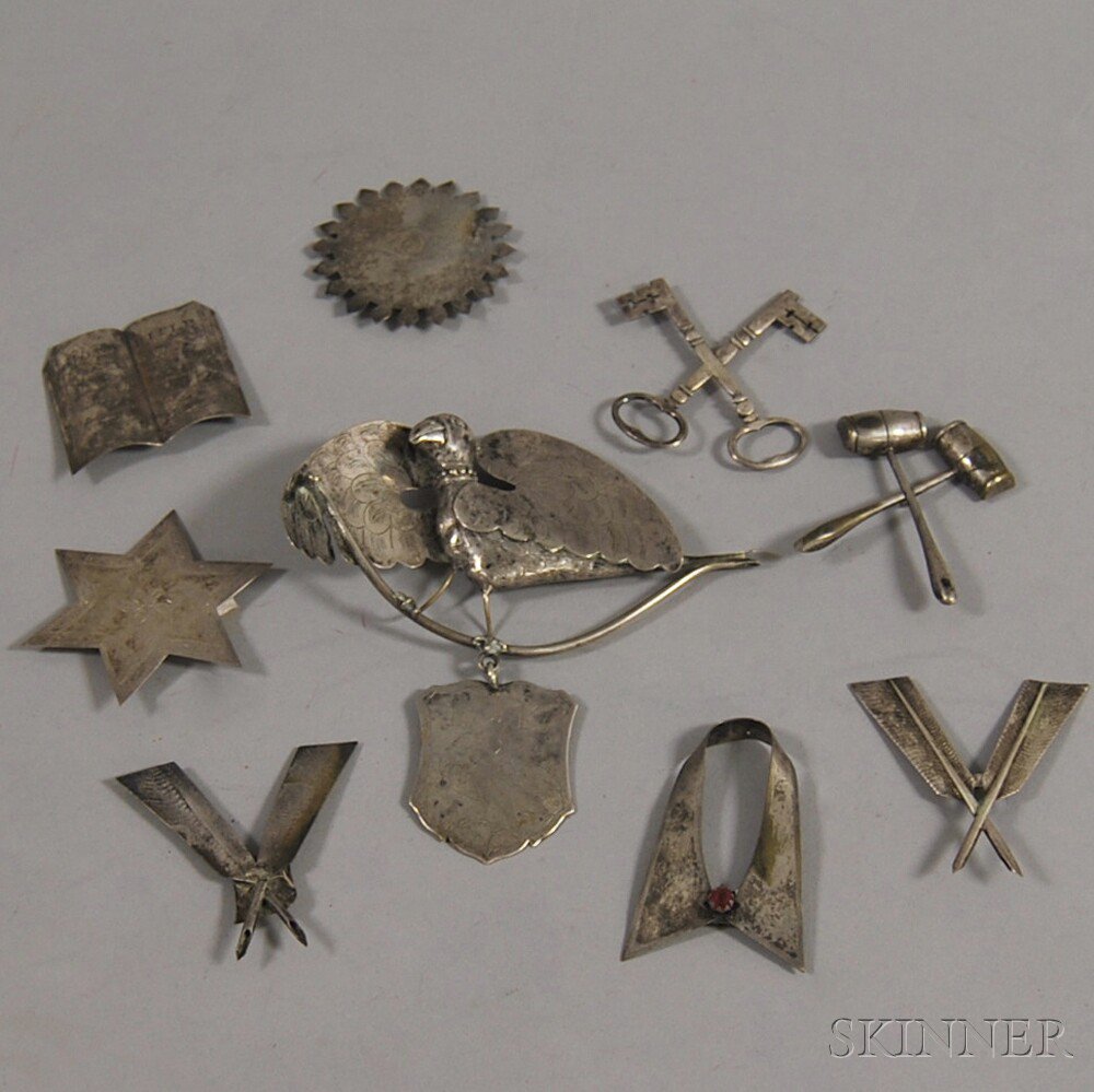 Appraisal: Nine Unmarked Silver Badges or Pendants including crossed keys two