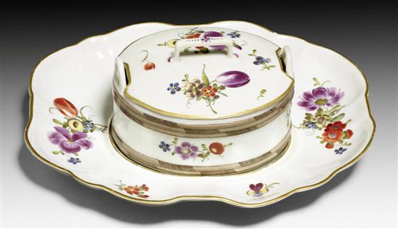 Appraisal: BUTTER DISH AND BASE WITH FLORAL DECORATION ZURICH CIRCA -