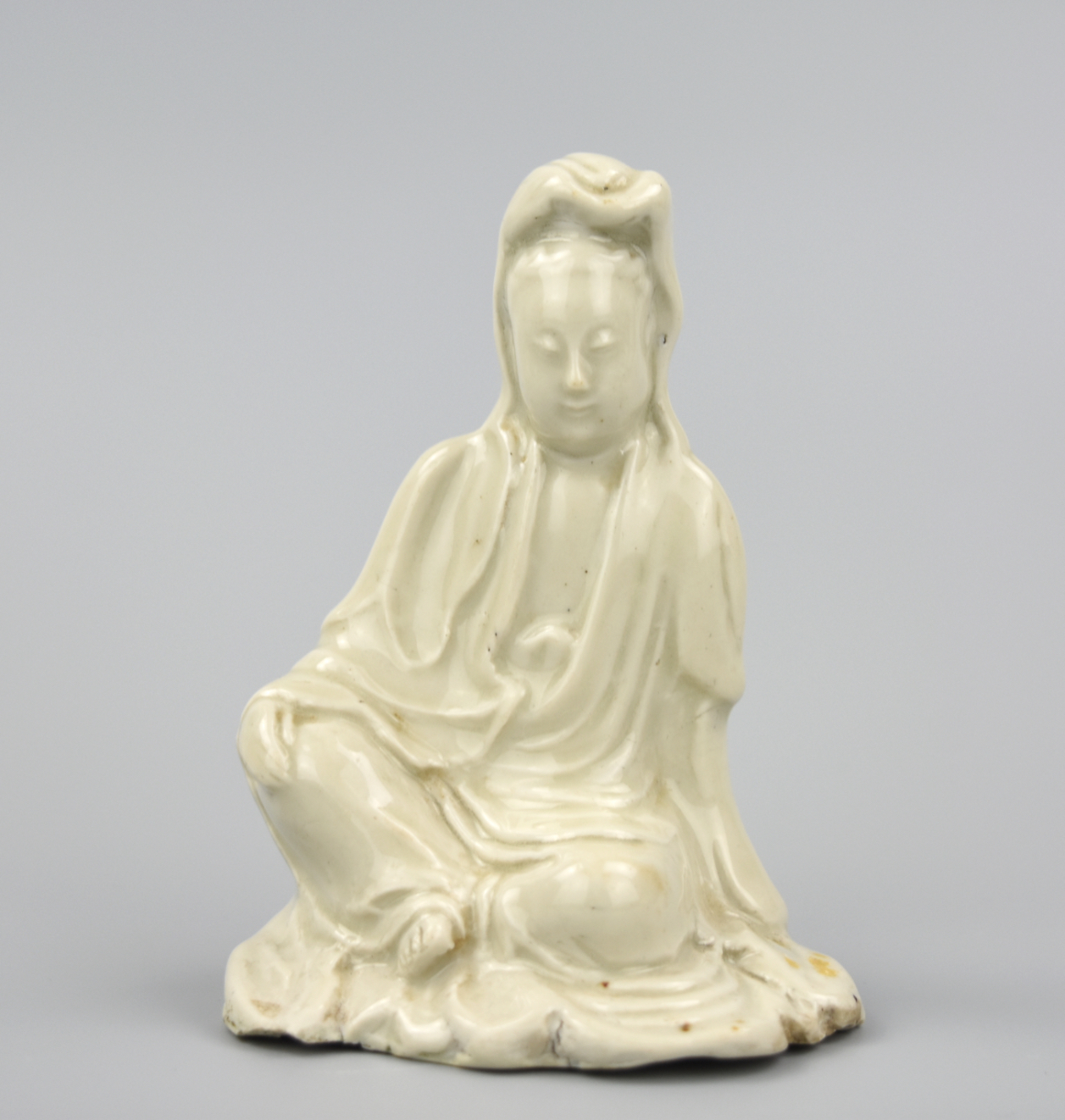 Appraisal: CHINESE SEATED BLANC DE CHINE GUANYIN TH C A late