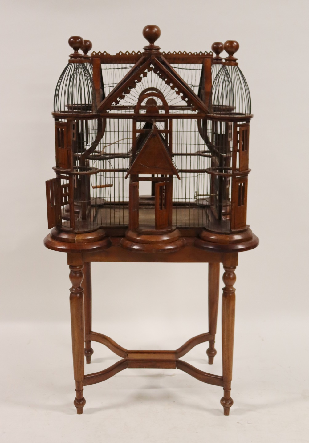 Appraisal: A VINTAGE CARVED MAHOGANY BIRDCAGE ON STAND From a Yonkers