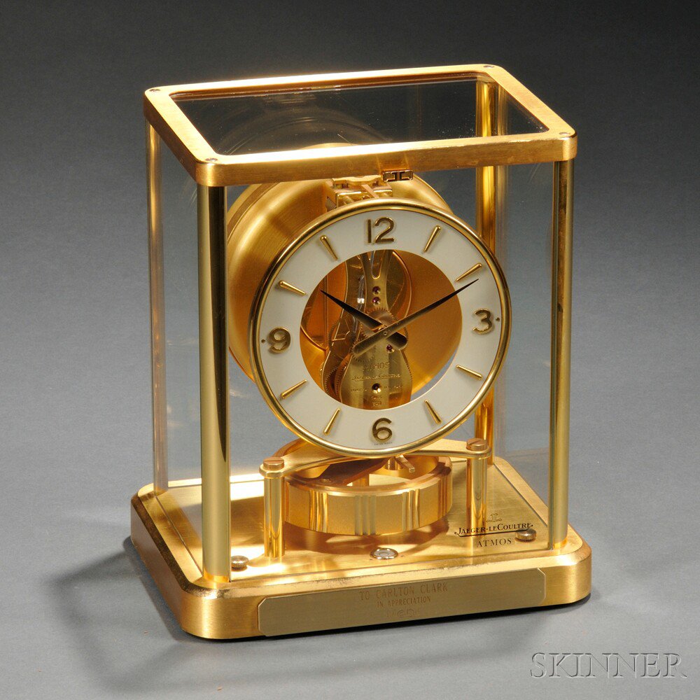 Appraisal: Atmos Brass and Glass Clock by Le Coultre Switzerland gilt-brass