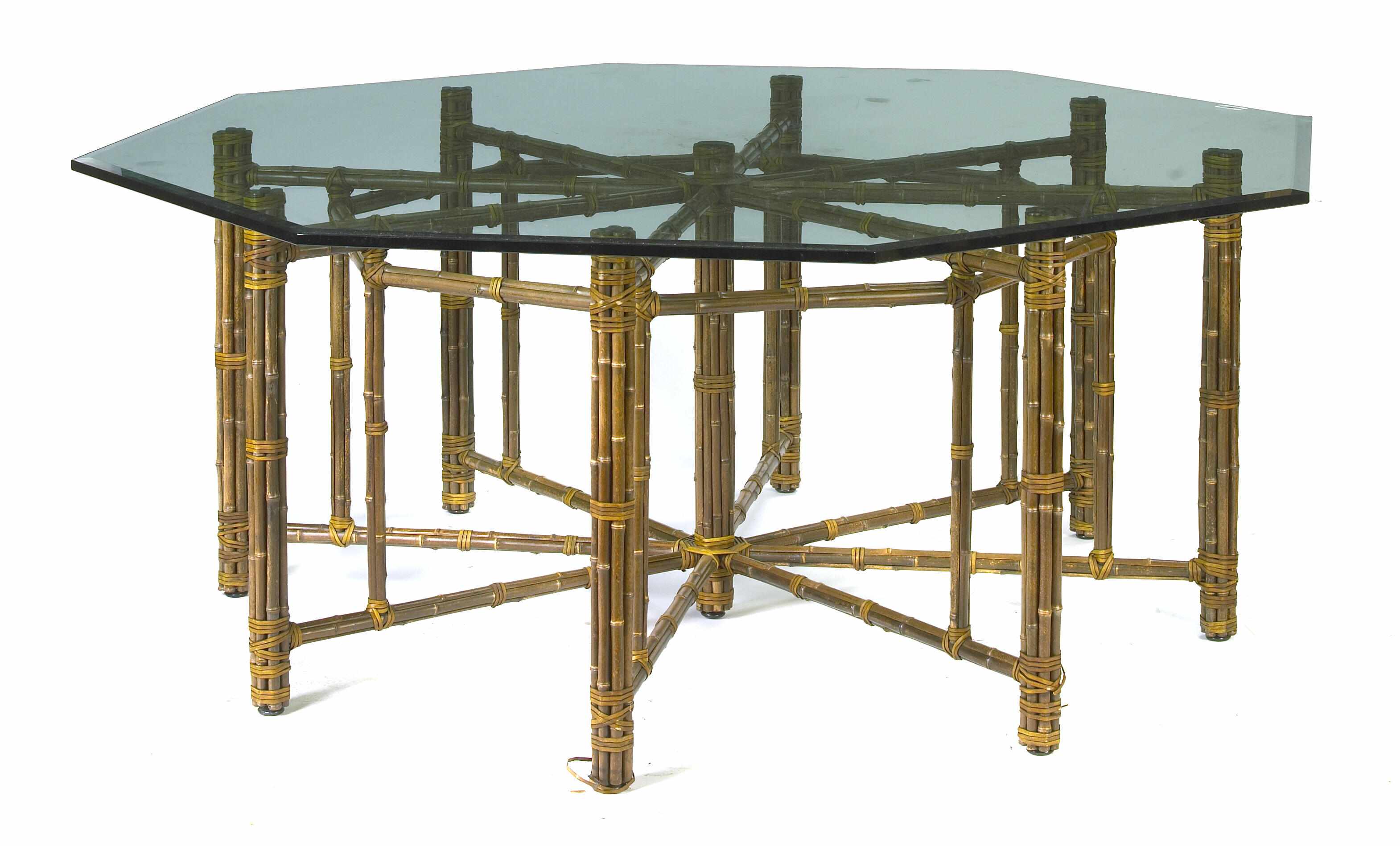 Appraisal: A McGuire rattan and glass octagonal table height in greatest