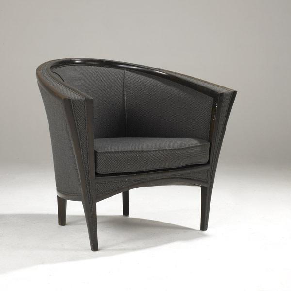 Appraisal: STEPHEN REIGER Easy chair in walnut with partial ebonized finish