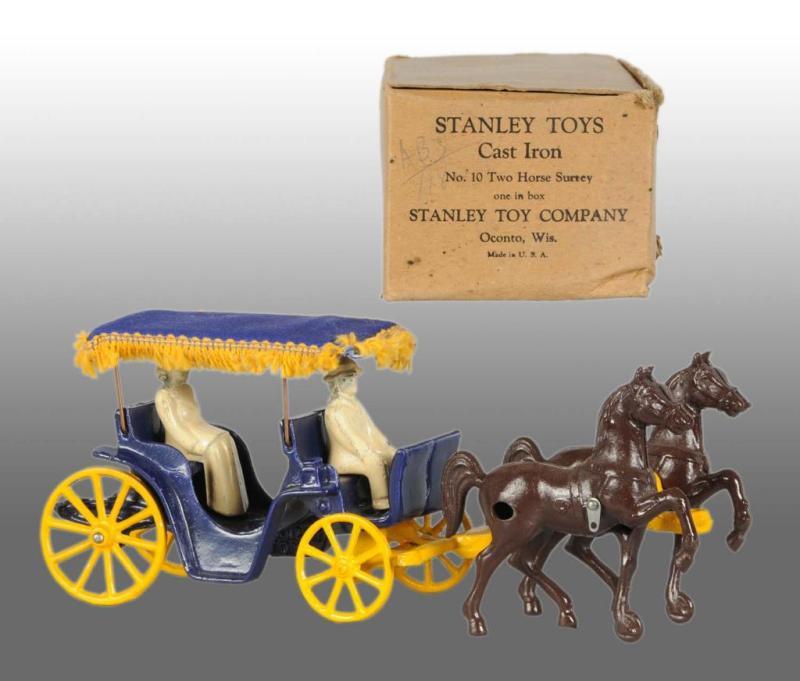 Appraisal: Cast Iron Stanley Toys -Horse Surrey Description Includes original box