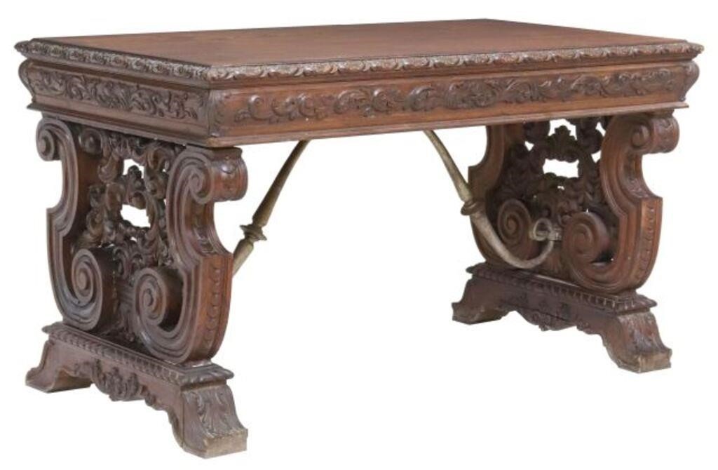 Appraisal: Spanish Renaissance Revival oak library desk th c having carved