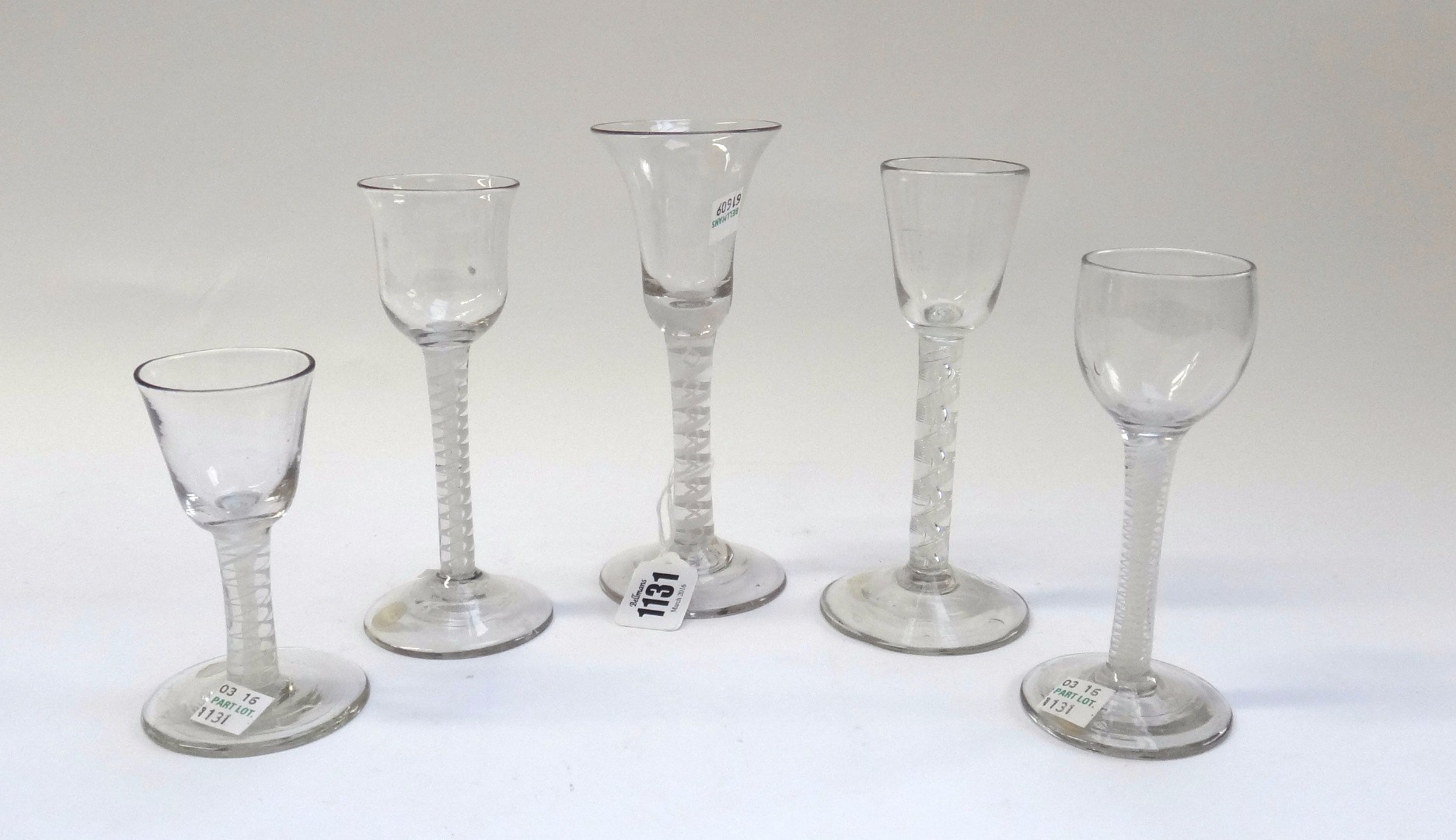 Appraisal: Five wine glasses circa - comprising four with opaque twist