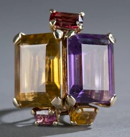 Appraisal: Amethyst and citrine cocktail ring A amethyst and citrine cocktail