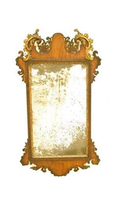 Appraisal: A George II mahogany and giltwood fret-frame mirror the arch