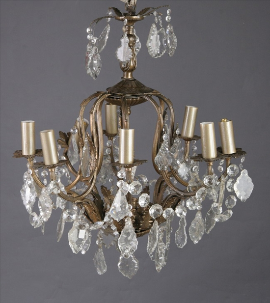 Appraisal: LOUIS XV STYLE GILT-METAL AND CRYSTAL EIGHT-LIGHT CHANDELIER th century