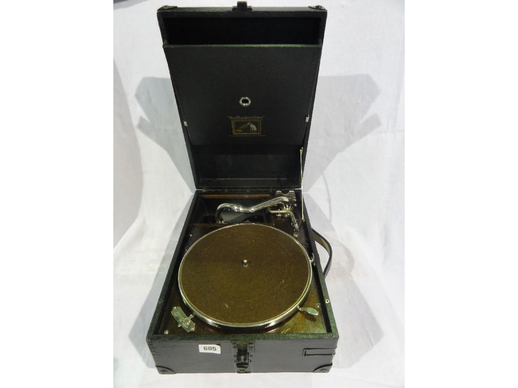 Appraisal: A portable wind-up gramophone by His Master's Voice retailed by