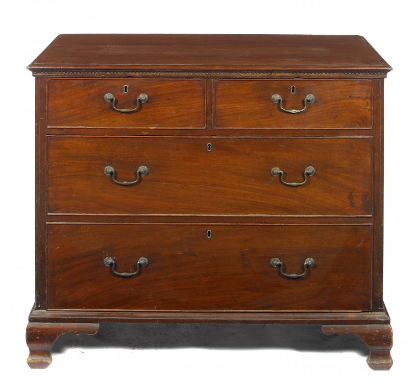 Appraisal: A GEORGE III MAHOGANY CHEST OF DRAWERS the dentil moulded