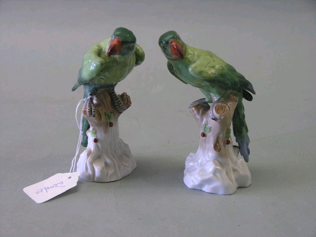 Appraisal: A pair of Dresden porcelain parrot models each green with