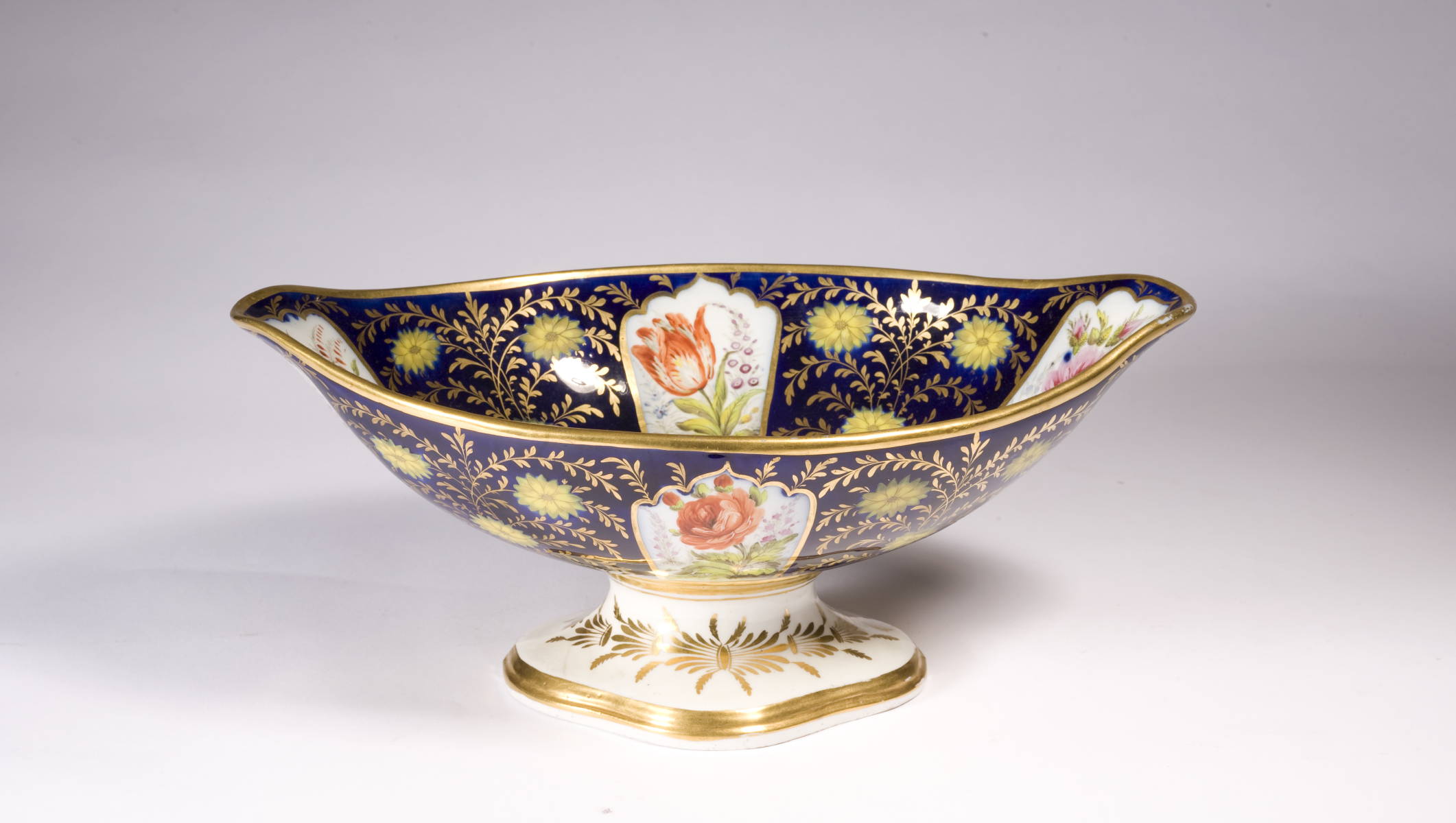 Appraisal: WORCESTER OVAL FOOTED COMPOTE WITH FINELY EXECUTED FLORAL MOTIFS Length