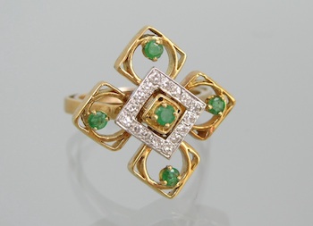 Appraisal: An Emerald and Diamond Quatrefoil Design Ring in k k