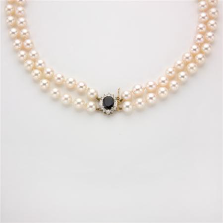 Appraisal: Double Strand Cultured Pearl Necklace with Sapphire and Diamond Clasp