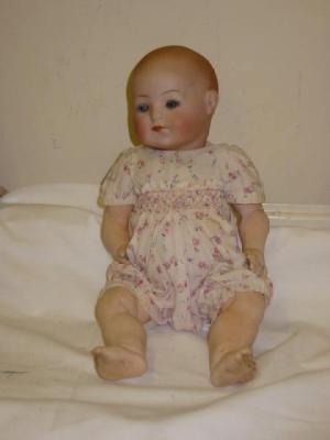 Appraisal: A Theodor Recknagel bisque head baby doll with blue glass