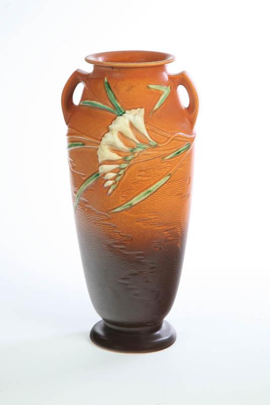 Appraisal: ROSEVILLE VASE Large double handled vase with brown to orange