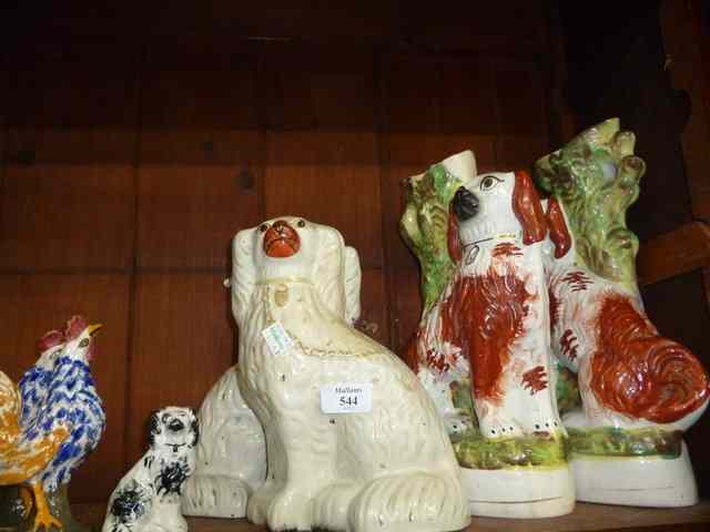 Appraisal: TWO STAFFORDSHIRE FLAT BACK SPANIEL VASES together with two further