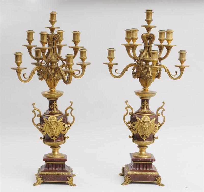 Appraisal: PAIR OF NAPOLEON III GILT-BRONZE MOUNTED ROUGE ROYALE MARBLE NINE-LIGHT