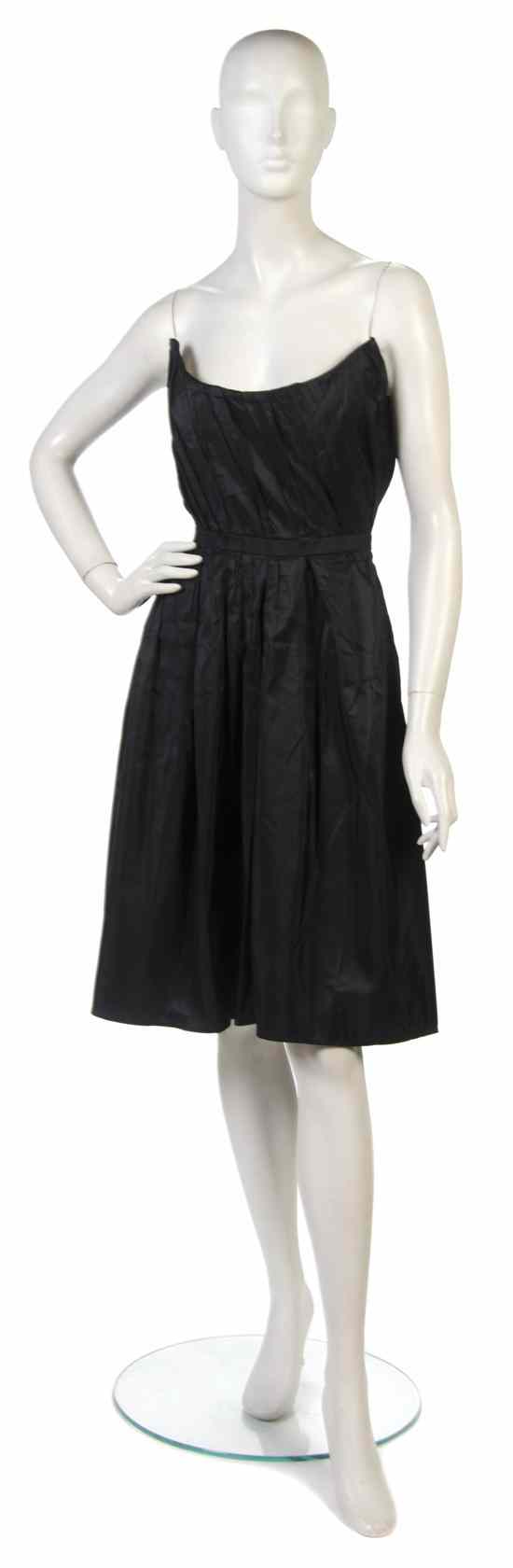 Appraisal: A Mila Schon Black Silk Cocktail Dress strapless with pleated