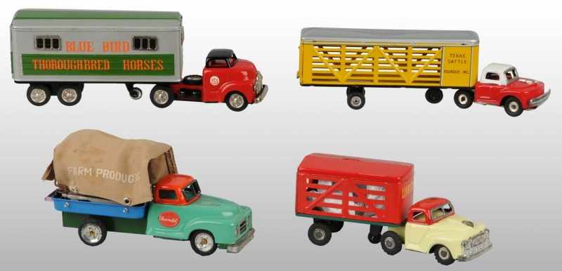 Appraisal: Lot of Tin Litho Truck Friction Toys Description Japanese Working