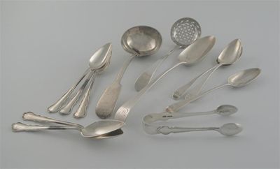 Appraisal: Mixed spoons a George II tablespoon George III sifter spoon