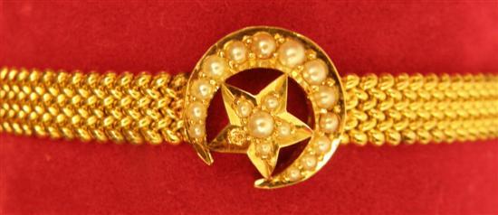 Appraisal: Victorian seed pearl set crescent bracelet on a woven strap